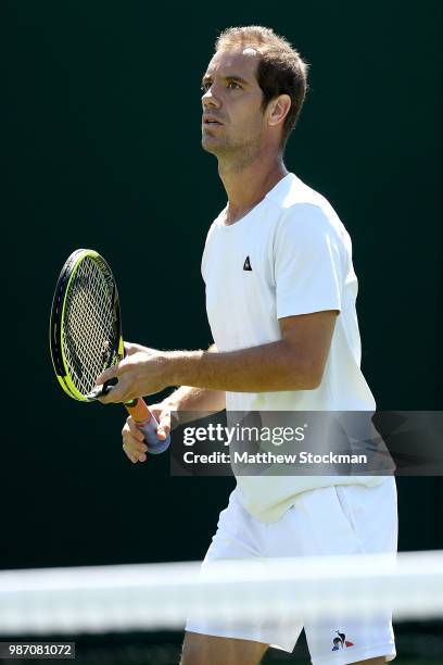 Richard Gasquet of France practices on court during training for the Wimbledon Lawn Tennis Championships at the All England Lawn Tennis and Croquet...