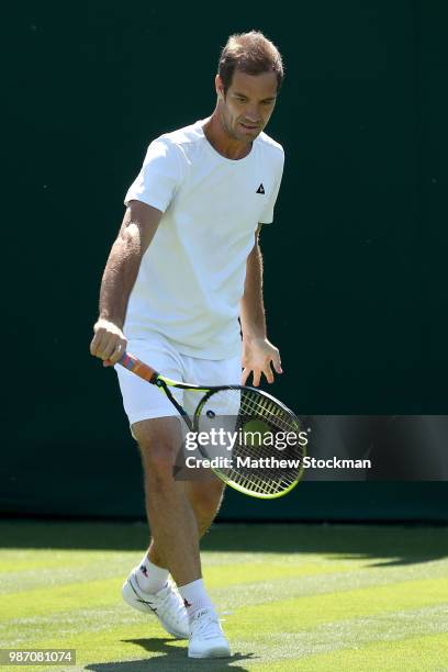 Richard Gasquet of France practices on court during training for the Wimbledon Lawn Tennis Championships at the All England Lawn Tennis and Croquet...