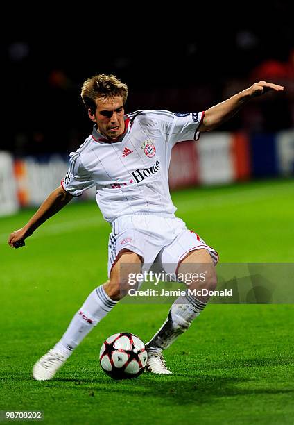 Philipp Lahm of Bayern Muenchen crosses the ball during the UEFA Champions League semi final second leg match between Olympique Lyonnais and Bayern...