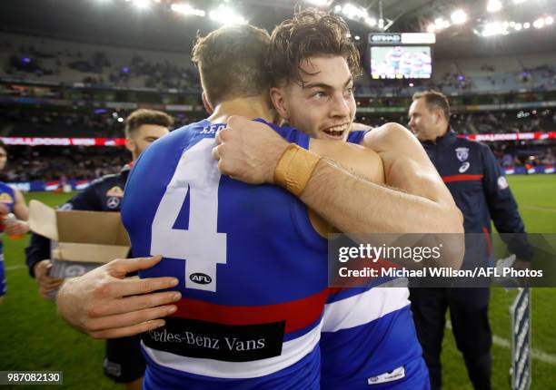 Marcus Bontempelli of the Bulldogs and Brad Lynch of the Bulldogs celebrate during the 2018 AFL round15 match between the Western Bulldogs and the...