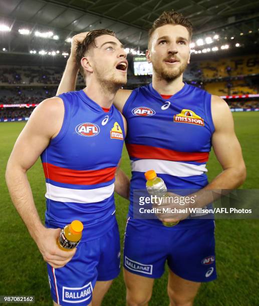 Marcus Bontempelli of the Bulldogs and Brad Lynch of the Bulldogs celebrate during the 2018 AFL round15 match between the Western Bulldogs and the...