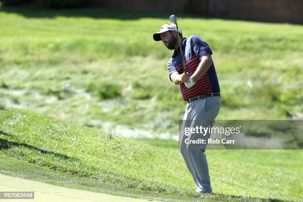 Marc Leishman of Australia plays a shot on the 15th hole during the second round of the Quicken Loans National at TPC Potomac on June 29, 2018 in...