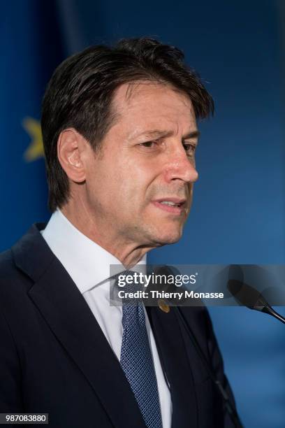 Italy's prime minister Giuseppe Conte talks to the media at the end of an EU Summit at European Council on June 29, 2018 in Brussels, Belgium.