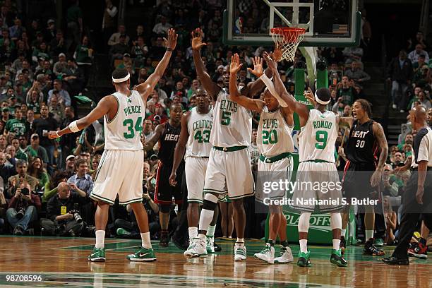 Paul Pierce, Kendrick Perkins, Kevin Garnett, Ray Allen and Rajon Rondo of the Boston Celtics celebrate a play against the Miami Heat in Game Five of...