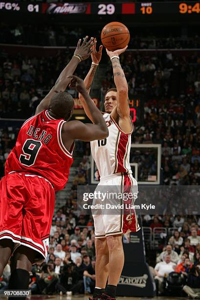 Delonte West of the Cleveland Cavaliers shoots over Luol Deng of the Chicago Bulls in Game Five of the Eastern Conference Quarterfinals at The...