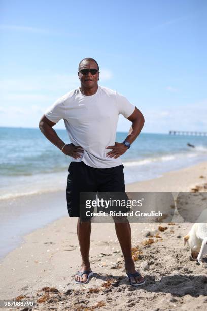 Where Are They Now: Portrait of former NFL running back and sports broadcaster Ahmad Rashad posing during photo shoot on beach. Juno Beach, FL...