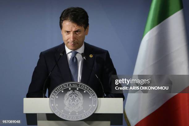 Italian Prime Minister Giuseppe Conte gives a press conference on the sidelines of an European Union leaders' summit, without Britain, to discuss...