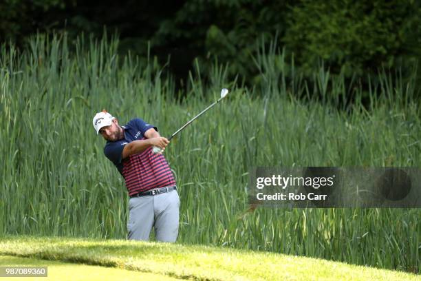 Marc Leishman of Australia plays a shot on the 10th hole during the second round of the Quicken Loans National at TPC Potomac on June 29, 2018 in...