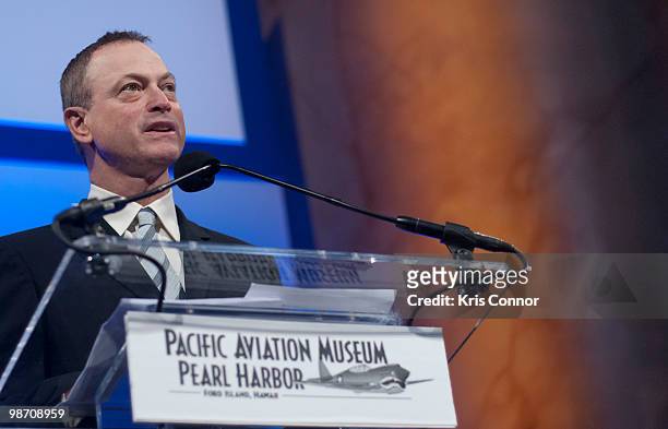 Gary Sinise speaks during the Pacific Aviation Museum Gala to honor Senate Appropriations Chairman Daniel Inouye at National Building Museum on April...