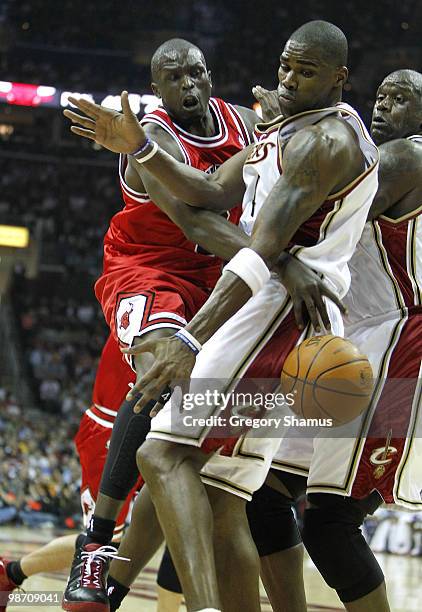 Luol Deng of the Chicago Bulls tries to pass around Antawn Jamison of the Cleveland Cavaliers in Game Five of the Eastern Conference Quarterfinals...