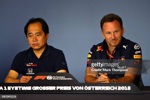 Red Bull Racing Team Principal Christian Horner and Toyoharu Tanabe of Honda in the Team Principals Press Conference during practice for the Formula...
