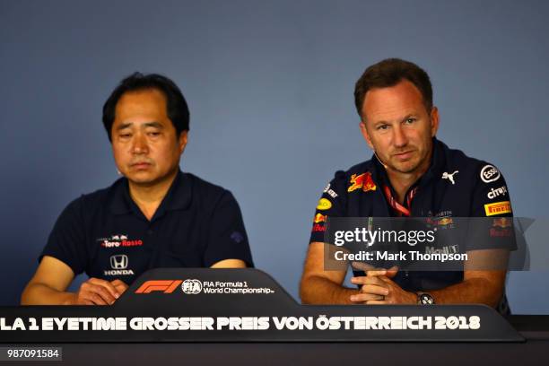 Red Bull Racing Team Principal Christian Horner and Toyoharu Tanabe of Honda in the Team Principals Press Conference during practice for the Formula...