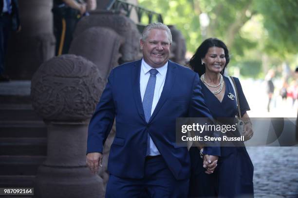 Premier Elect Doug Ford arrives at Queen's Park with wife Karla to be sworn in as the Premier of Ontario in Toronto. June 29, 2018.