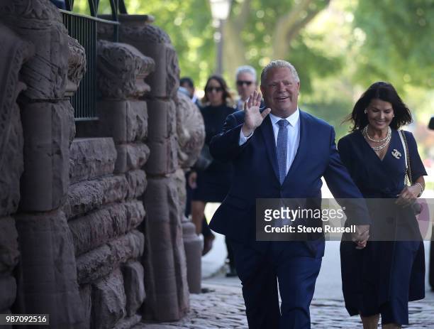 Premier Elect Doug Ford arrives at Queen's Park with wife Karla to be sworn in as the Premier of Ontario in Toronto. June 29, 2018.