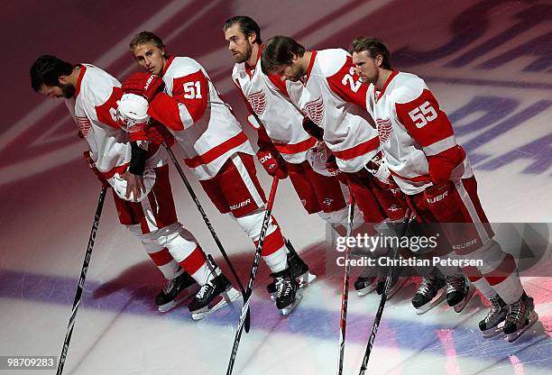 Todd Bertuzzi, Valtteri Filppula, Henrik Zetterberg, Brad Stuart and Niklas Kronwall of the Detroit Red Wings stand attended for the singing of the...