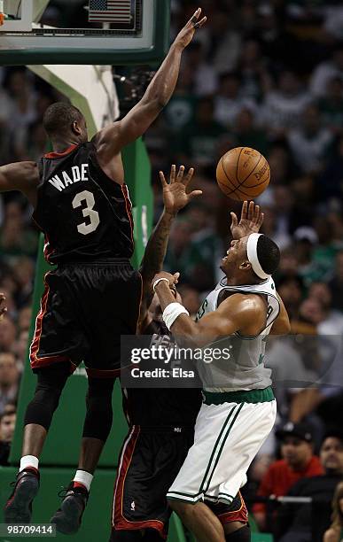 Paul Pierce of the Boston Celtics tries to shoot over Dwyane Wade and Quentin Richardson of the Miami Heat during Game Five of the Eastern Conference...