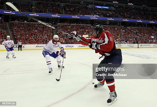 Alexander Semin of the Washington Capitals misses a shot against Ryan O'Byrne of the Montreal Canadiens in Game Five of the Eastern Conference...