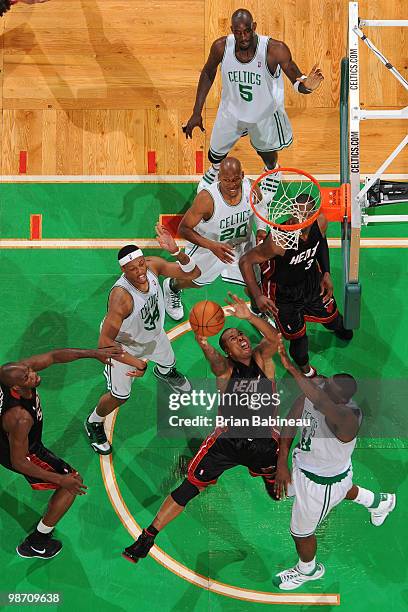 Quentin Richardson of the Miami Heat goes up for a rebound against Kendrick Perkins of the Boston Celtics in Game Five of the Eastern Conference...