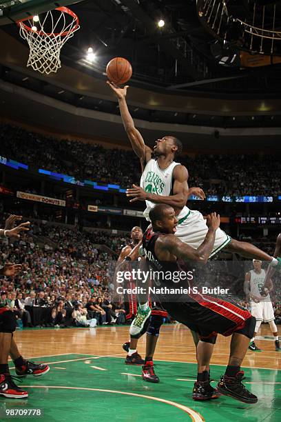 Tony Allen of the Boston Celtics shoots against Quentin Richardson of the Miami Heat in Game Five of the Eastern Conference Quarterfinals during the...