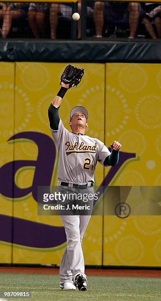 Outfielder Ryan Sweeney of the Oakland Athletics catches a fly ball against the Tampa Bay Rays during the game at Tropicana Field on April 27, 2010...