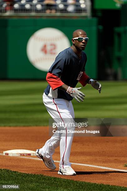 Outfielder Nyjer Morgan of the Washington Nationals takes his lead off thirdbase during batting practice prior to a game on April 22, 2010 against...