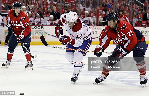 Mike Knuble of the Washington Capitals skates against Mike Cammalleri of the Montreal Canadiens in Game Five of the Eastern Conference Quarterfinals...