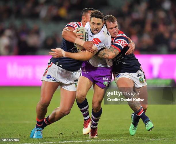 Billy Slater of the Storm competes during the round 16 NRL match between the Sydney Roosters and the Melbourne Storm at Adelaide Oval on June 29,...