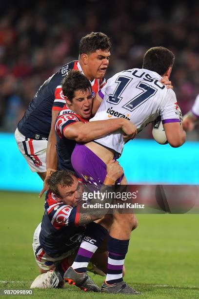 Jahrome Hughes of the Storm competes for the ball during the round 16 NRL match between the Sydney Roosters and the Melbourne Storm at Adelaide Oval...