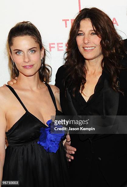 Actresses Amanda Peet and Catherine Keener attend the premiere of "Please Give" during the 2010 Tribeca Film Festival at the Tribeca Performing Arts...