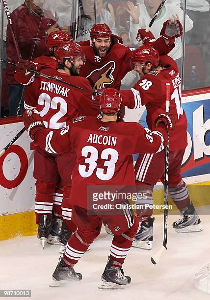 The Phoenix Coyotes celebrate after Vernon Fiddler scored a second period goal against the Detroit Red Wings in Game Seven of the Western Conference...