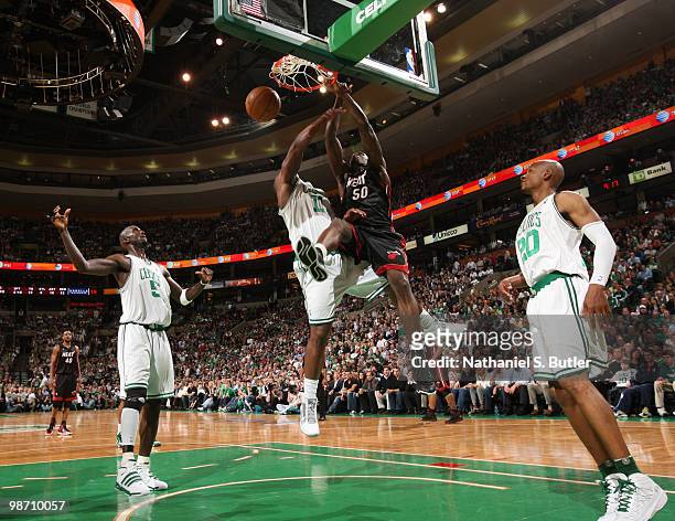 Joel Anthony of the Miami Heat shoots against Glen Davis of the Boston Celtics in Game Five of the Eastern Conference Quarterfinals during the 2010...