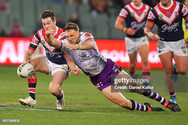 Luke Keary of the Roosters controls the ball during the round 16 NRL match between the Sydney Roosters and the Melbourne Storm at Adelaide Oval on...