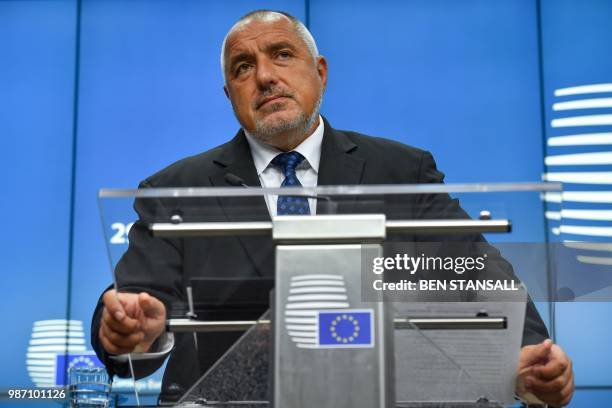 Bulgaria's Prime Minister Boyko Borisov looks on as he gives a joint press conference with President of the European Commission and European Council...