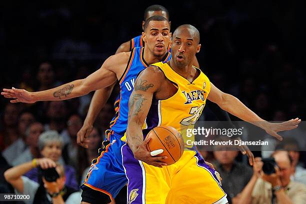Kobe Bryant of the Los Angeles Lakers makes a move on Thabo Sefolosha of the Oklahoma City Thunder in the first quarter during Game Two of the...