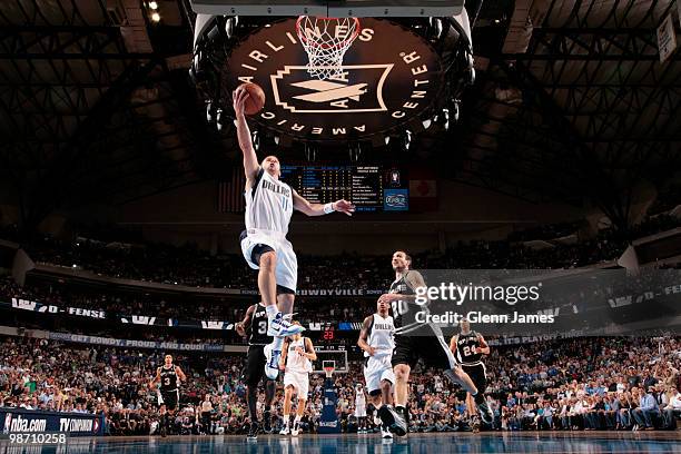 Jose Juan Barea of the Dallas Mavericks goes in for the layup against the San Antonio Spurs in Game Five of the Western Conference Quarterfinals...