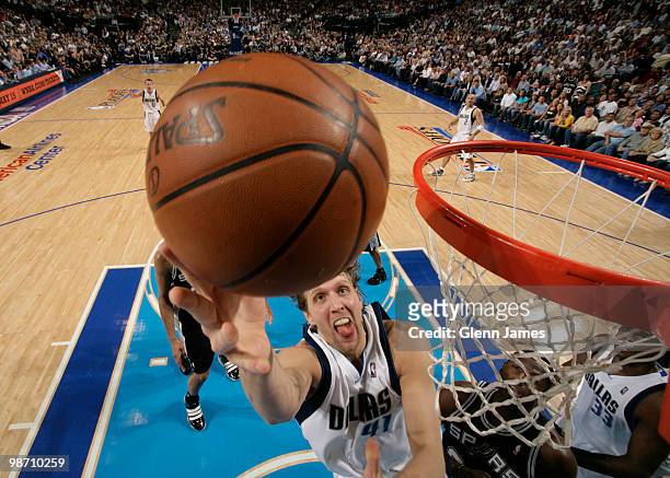 Dirk Nowitzki of the Dallas Mavericks goes in for the layup against the San Antonio Spurs in Game Five of the Western Conference Quarterfinals during...