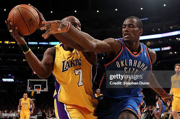 Lamar Odom of the Los Angeles Lakers has the ball as Serge Ibaka of the Oklahoma City Thunder goes after it in the first half during Game Two of the...