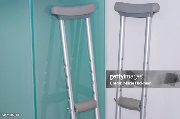 pair of crutches. - larchmont stock pictures, royalty-free photos & images