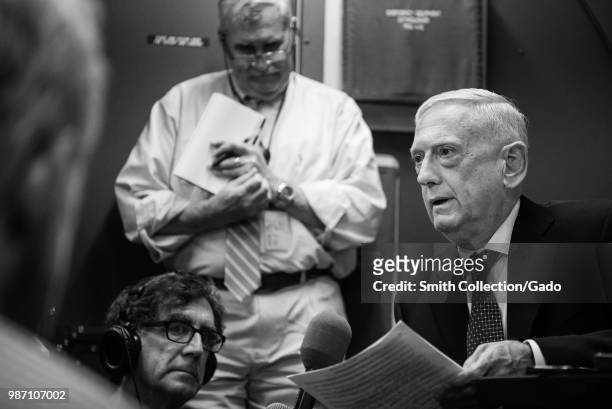 Secretary of Defense James N. Mattis speaking to reporters during a flight from Andrews Air Force Base, Maryland to Alaska, June 24, 2018. Image...