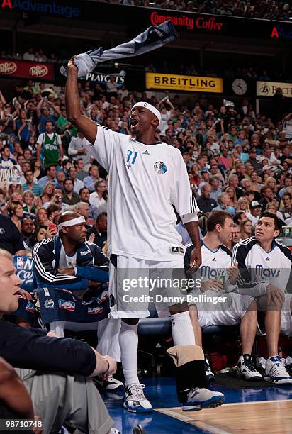 Jason Terry of the Dallas Mavericks cheers on his team from the bench against the San Antonio Spurs in Game Five of the Western Conference...