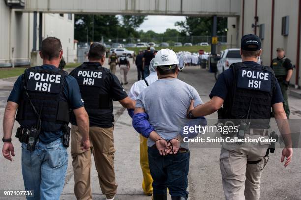 Immigration and Customs Enforcement's Homeland Security Investigations special agents arrested alleged immigration violators at Fresh Mark, Salem,...