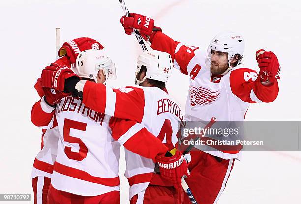 Henrik Zetterberg of the Detroit Red Wings celebrates with teammates after Nicklas Lidstrom scored a second period goal against the Phoenix Coyotes...