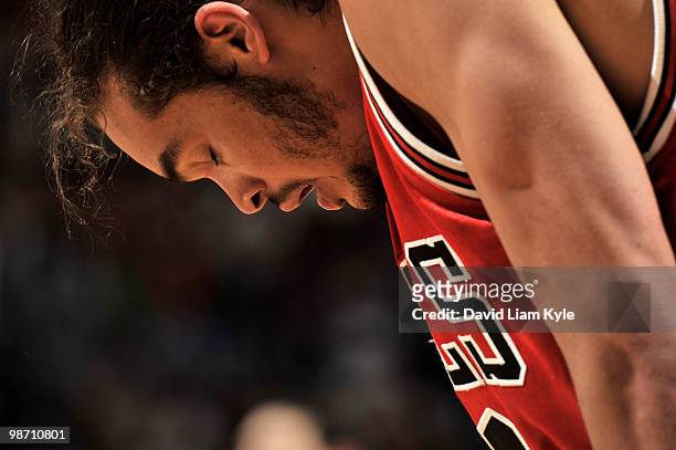 Joakim Noah of the Chicago Bulls takes a breather during a break in the action in the final minutes of their series clinching loss against the...