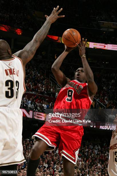Luol Deng of the Chicago Bulls shoots the fade away over Shaquille O'Neal of the Cleveland Cavaliers in Game Five of the Eastern Conference...