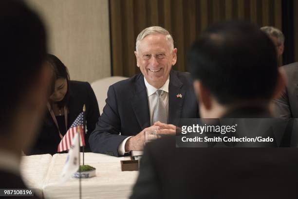 Secretary of Defense James N Mattis speaking with Republic of Korea Minister of National Defense Song Young-moo at the Shangri-La Dialogue,...