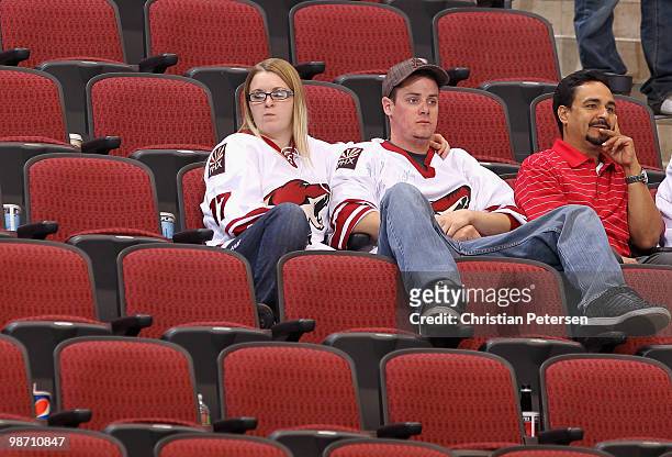 Fans of the Phoenix Coyotes react after being defeated by the Detroit Red Wings in Game Seven of the Western Conference Quarterfinals during the 2010...