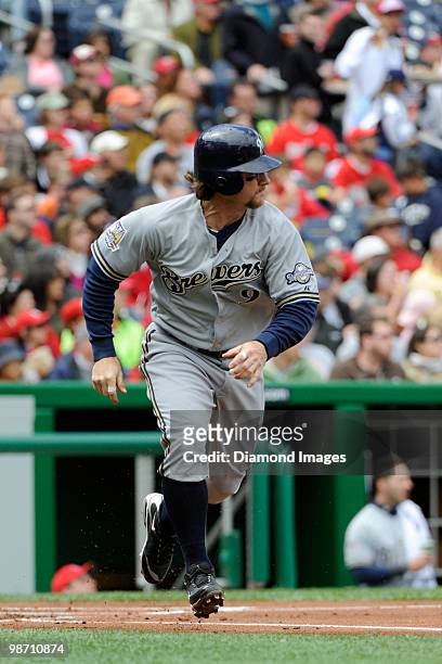 Catcher Gregg Zaun of the Milwaukee Brewers runs towards firstbase after hitting an RBI single during the top of the first inning of a game on April...