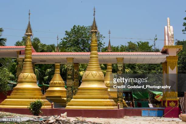 myanmar: kyaik pun pagoda in bago - bago stock pictures, royalty-free photos & images
