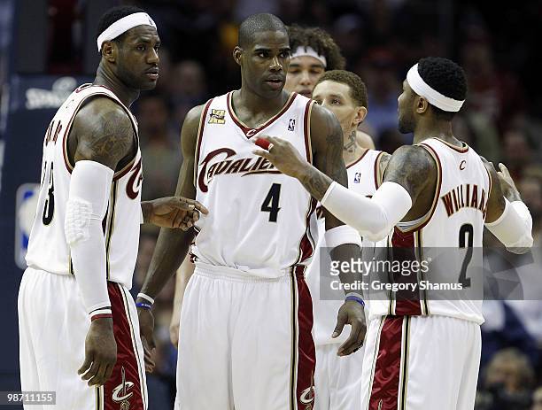 Mo Williams of the Cleveland Cavaliers talks with Antawn Jamison and LeBron James while playing the Chicago Bulls in Game Five of the Eastern...