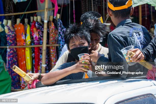 myanmar: thingyan water festival - bago stock pictures, royalty-free photos & images